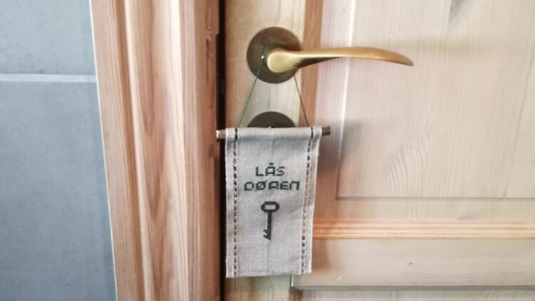 Lås døren skilt på håndtag