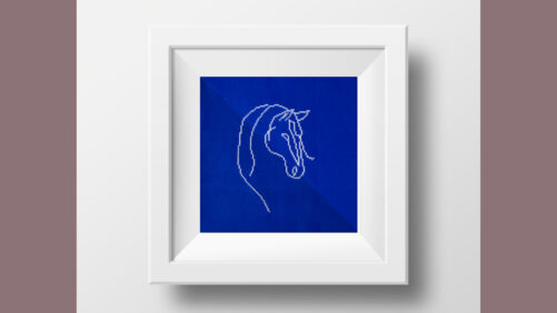 Broderet hestehoved i ramme