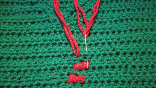 Hæklet vest med korssting