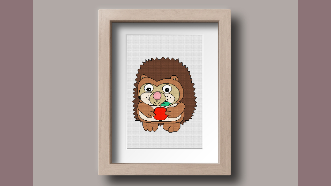 Pindsvin med æble i ramme